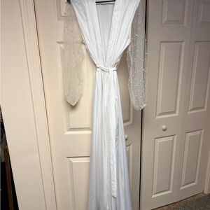 Elegant White Gown with Sheer Sleeves